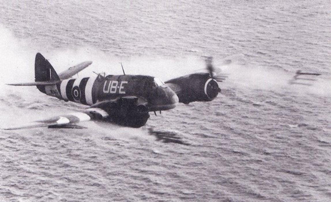 Beaufighter firing rockets.