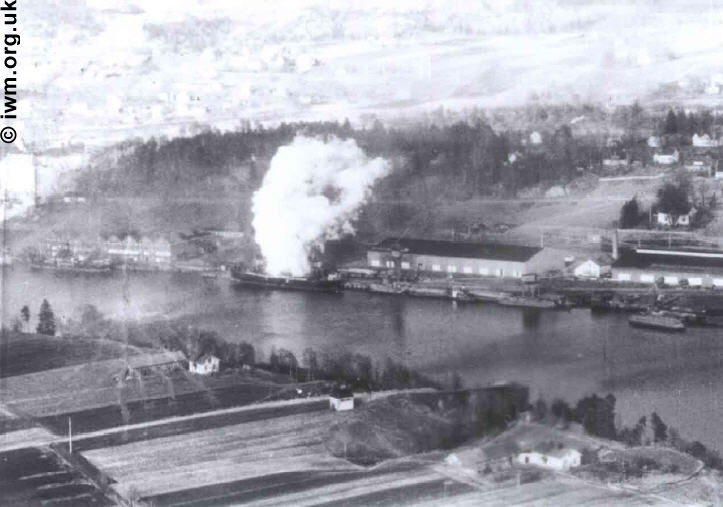 A Merchant vessel burns after Mosquitos attack.